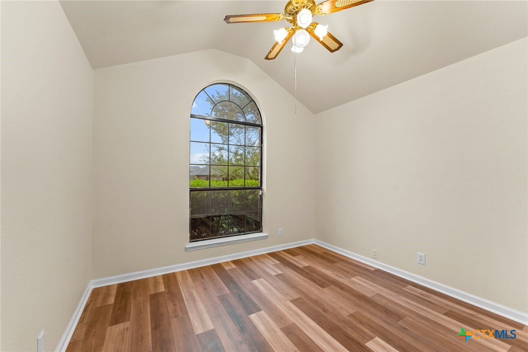 2504 Lazy Ridge Drive Killeen, TX 76543 - Photo 21 of 27 a view of room with window and wooden floor