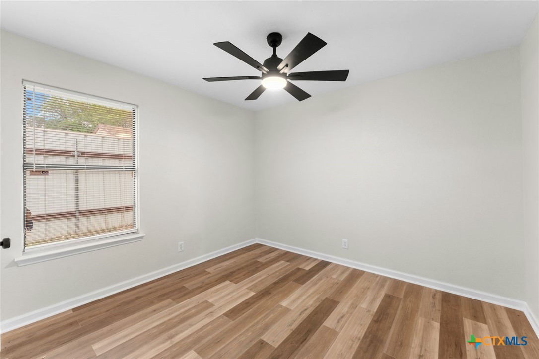 2504 Lazy Ridge Drive Killeen, TX 76543 - Photo 25 of 27 a view of a room with window and ceiling fan