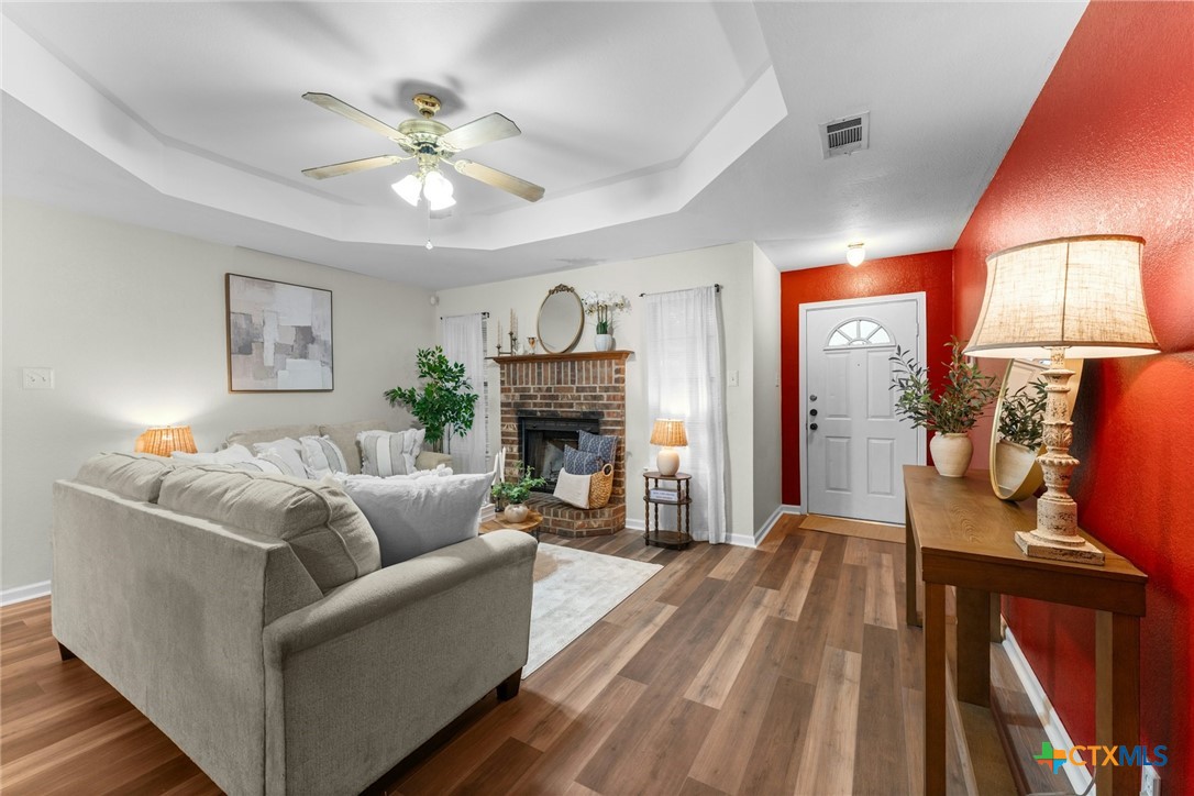 2504 Lazy Ridge Drive Killeen, TX 76543 - Photo 5 of 27 a living room with furniture and a fireplace