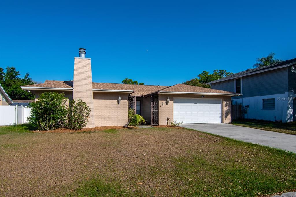 a house view with a outdoor space