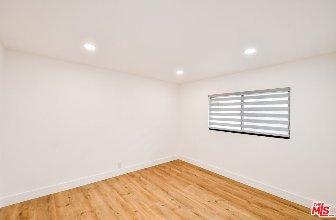 270 Grace Drive South Pasadena, CA 91030 - Photo 6 of 8 a view of empty room with wooden floor and fan