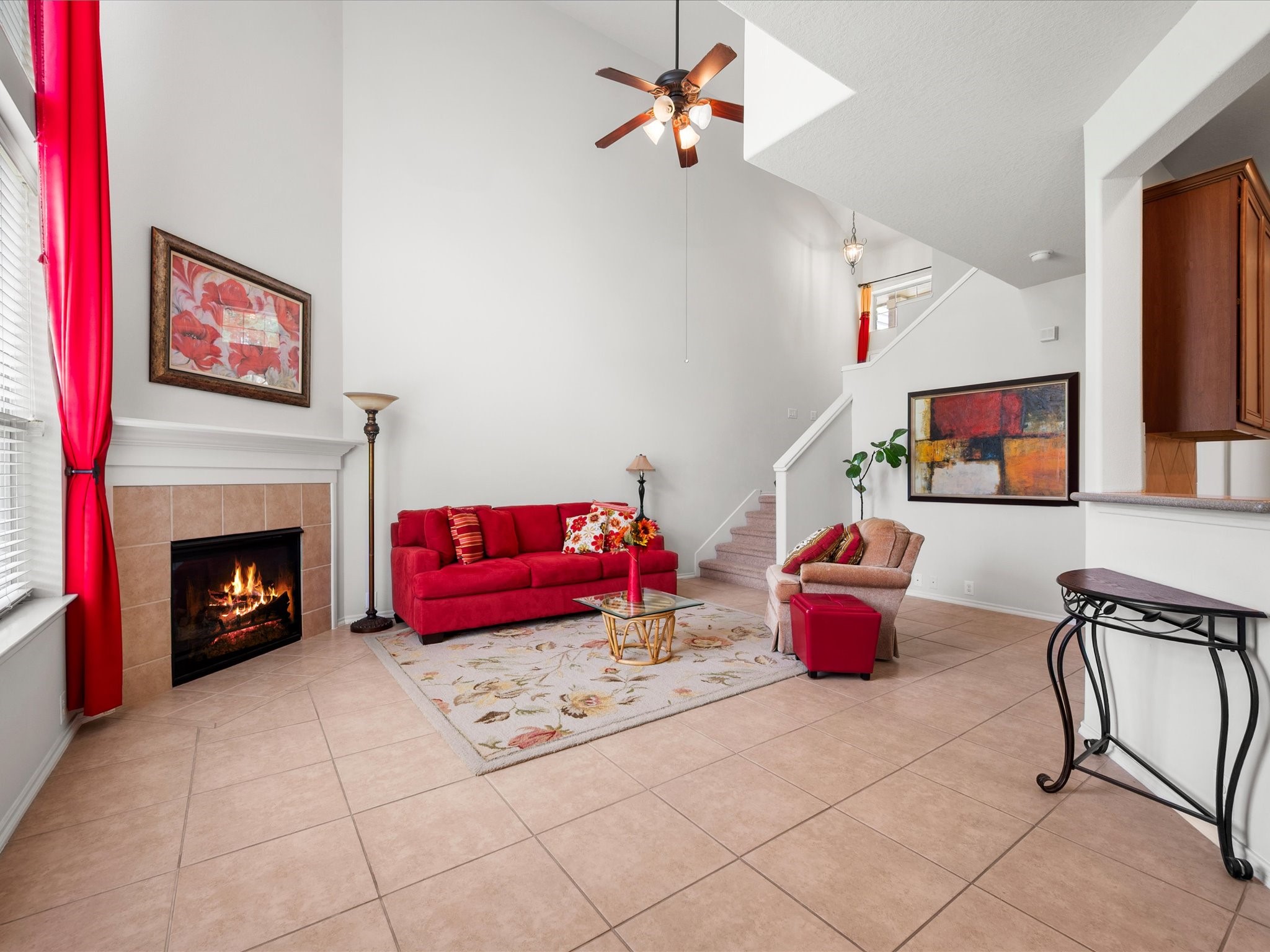 13600 Breton Ridge Street, Unit 31C Houston, TX 77070 - Photo 10 of 31 The gas fireplace serves as a beautiful focal point, adding warmth and character to the living room while creating the perfect setting for relaxing evenings at home.