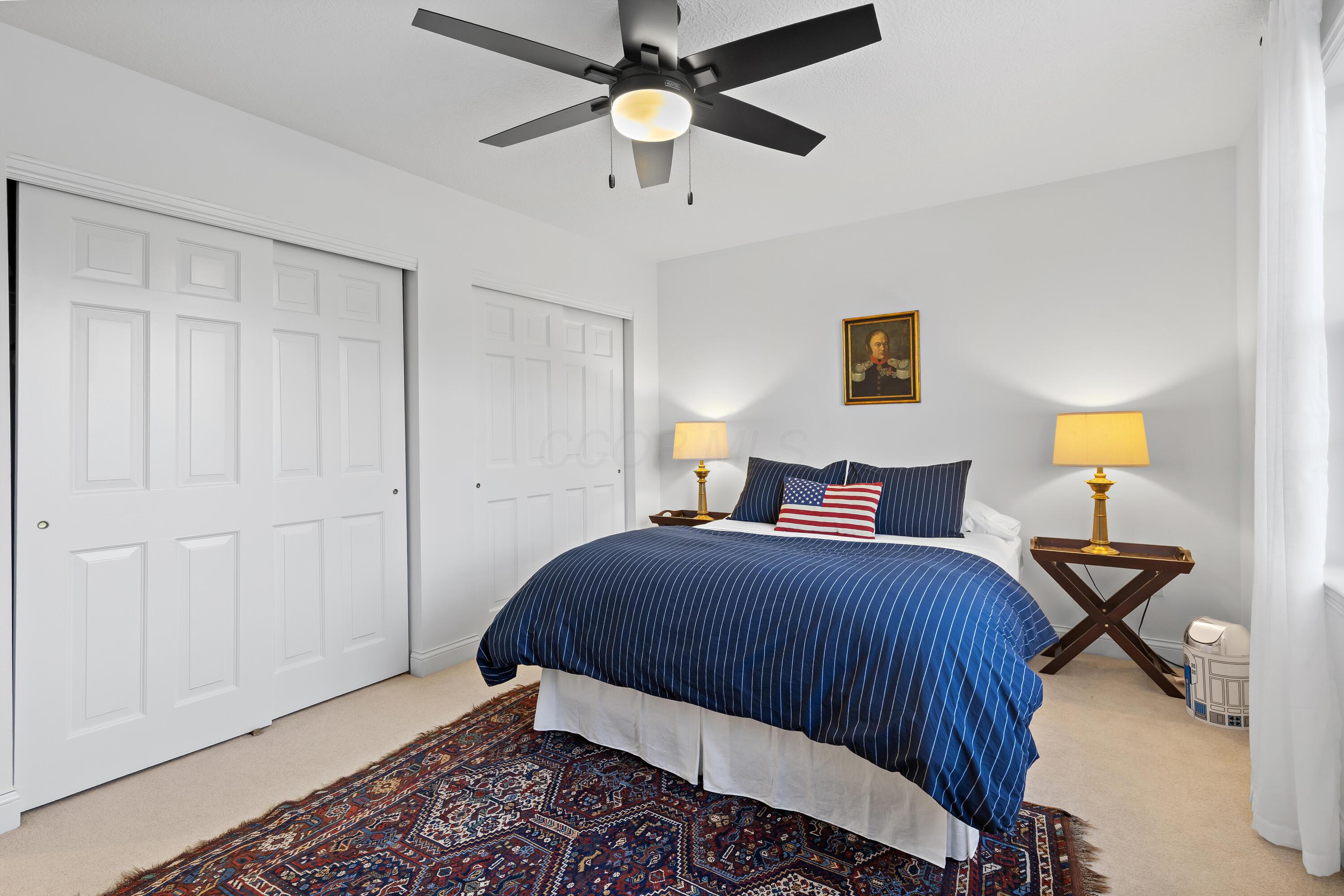 1364 Dale Ford Road Delaware, OH 43015 - Photo 59 of 112 • Light sand carpet • White painted walls • Attic access • Lighted ceiling fan • Closet with double sliding doors • Jack & Jill bath access • Drapes remain