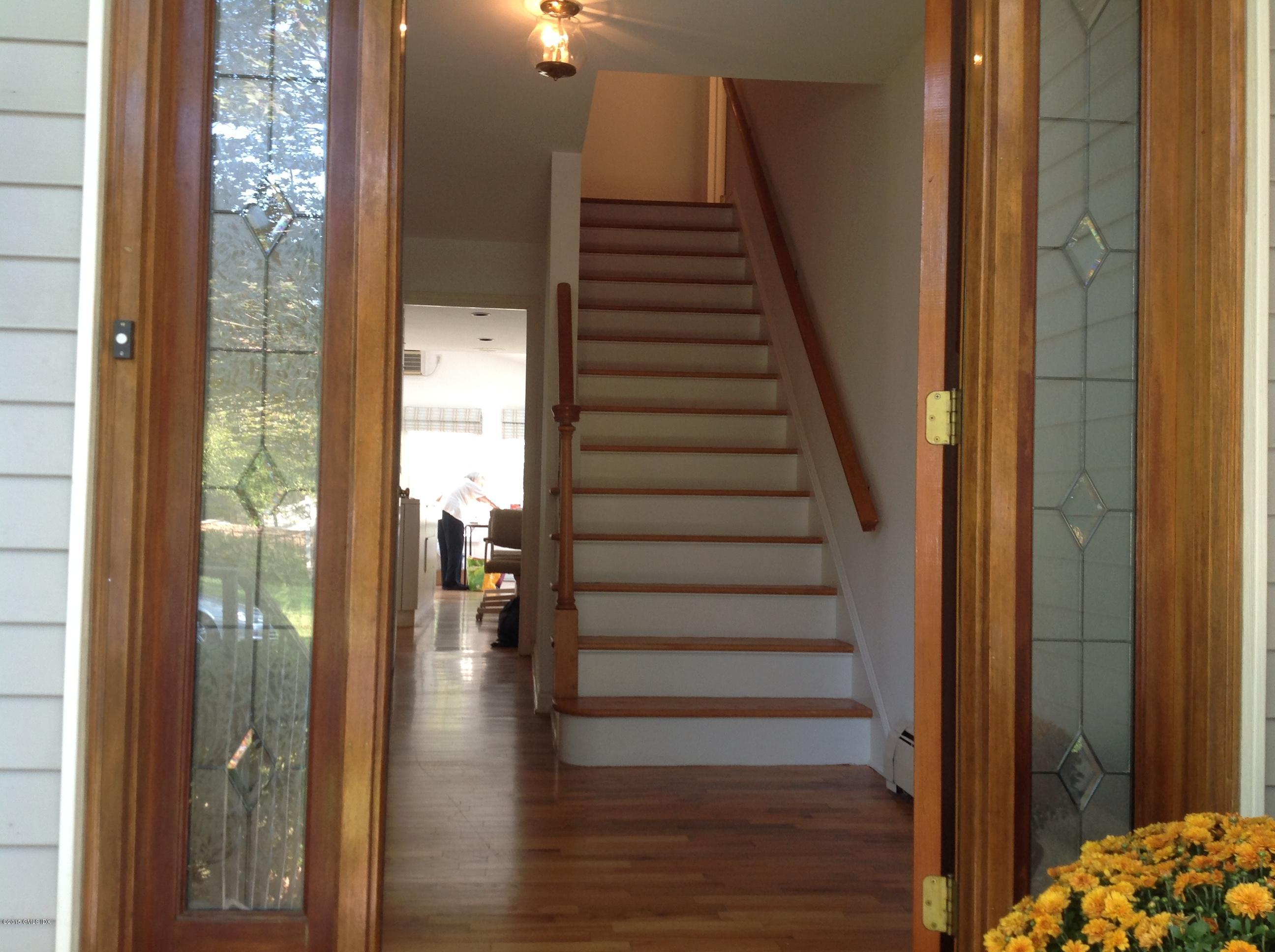 6 Griffith Road Riverside, CT 06878 - Photo 3 of 24 a view of entryway with wooden floor