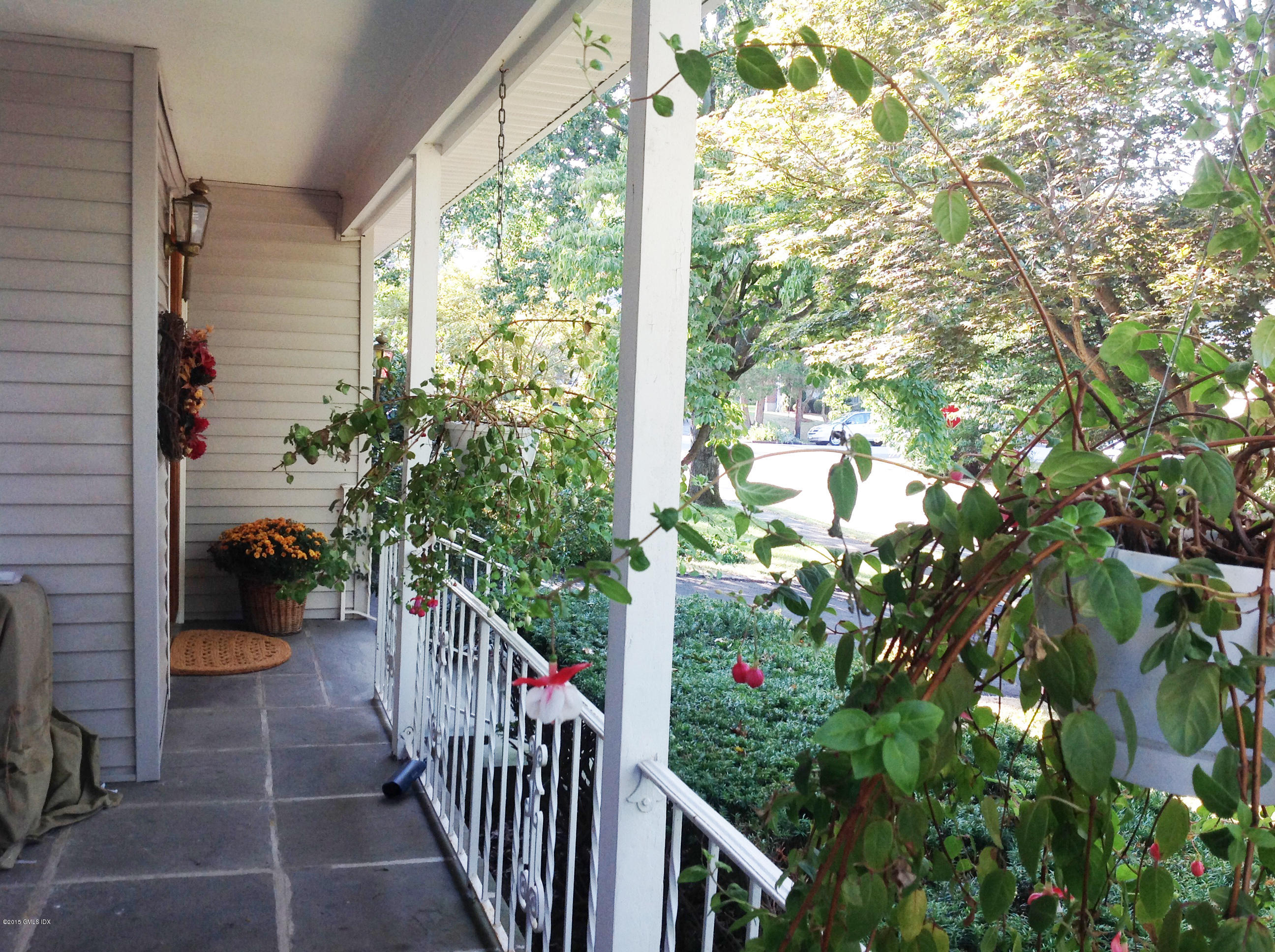 6 Griffith Road Riverside, CT 06878 - Photo 4 of 24 a view of a balcony with flower plants