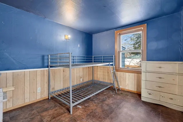 a room with stairs and a window