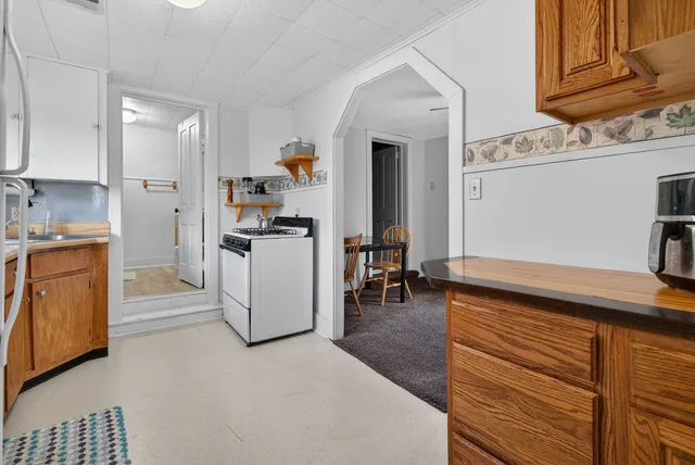a kitchen view with cabinets and stainless steel appliances
