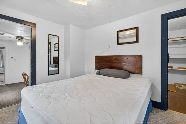 a view of a hallway with windows