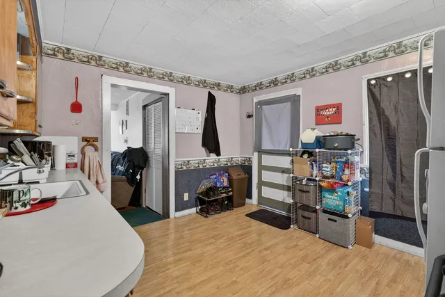 a bed room with a bed and a flat screen tv