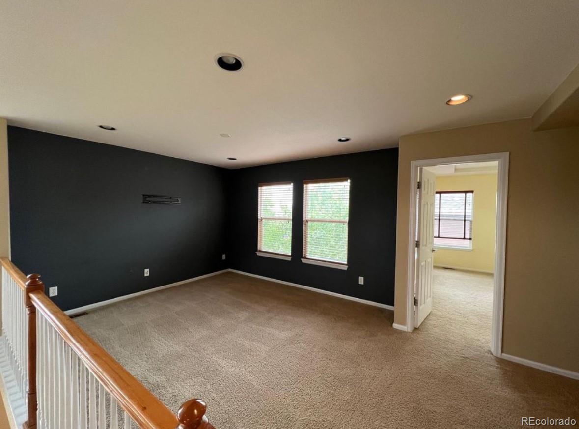 10847 Towerbridge Road Highlands Ranch, CO 80130 - Photo 12 of 14 a view of empty room with window