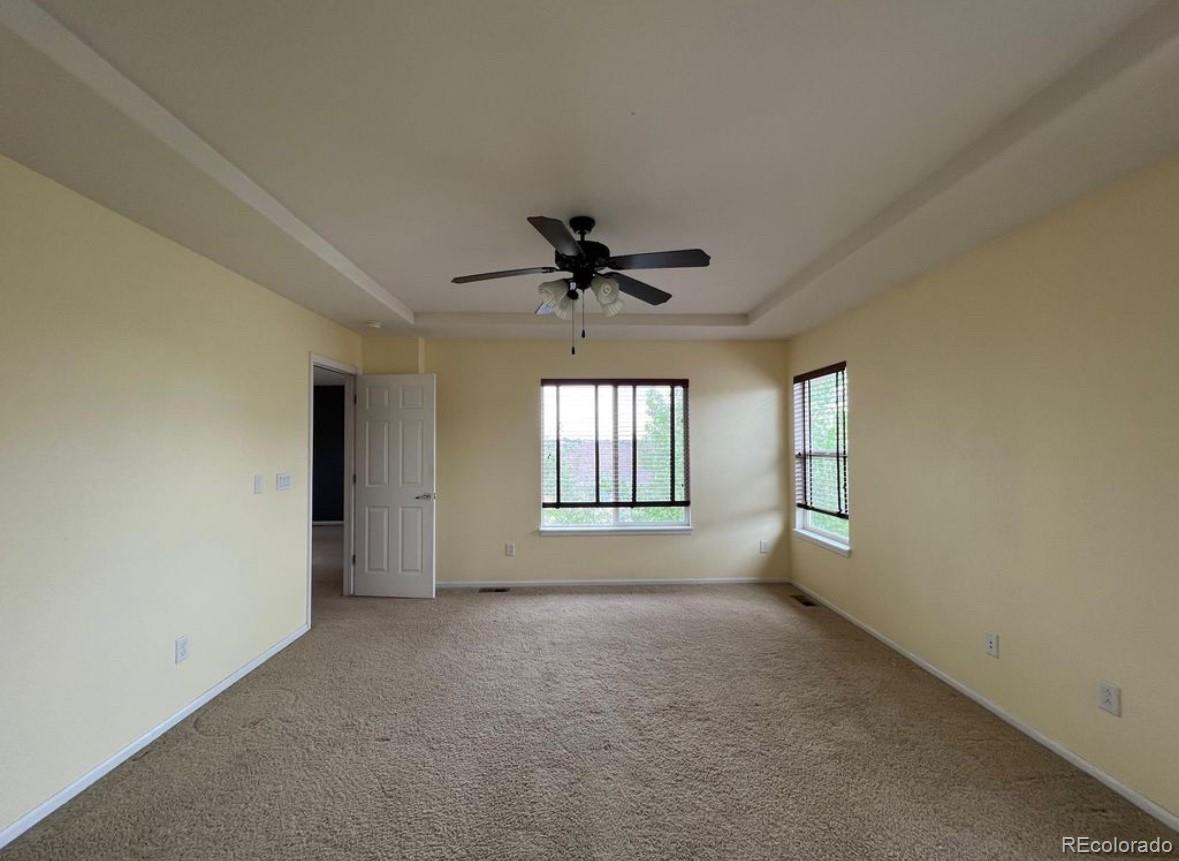 10847 Towerbridge Road Highlands Ranch, CO 80130 - Photo 8 of 14 a view of an empty room with a window