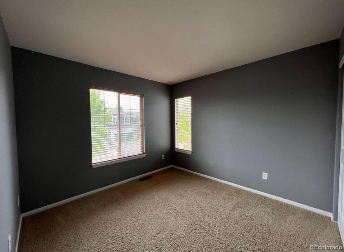 10847 Towerbridge Road Highlands Ranch, CO 80130 - Photo 10 of 14 an empty room with a window