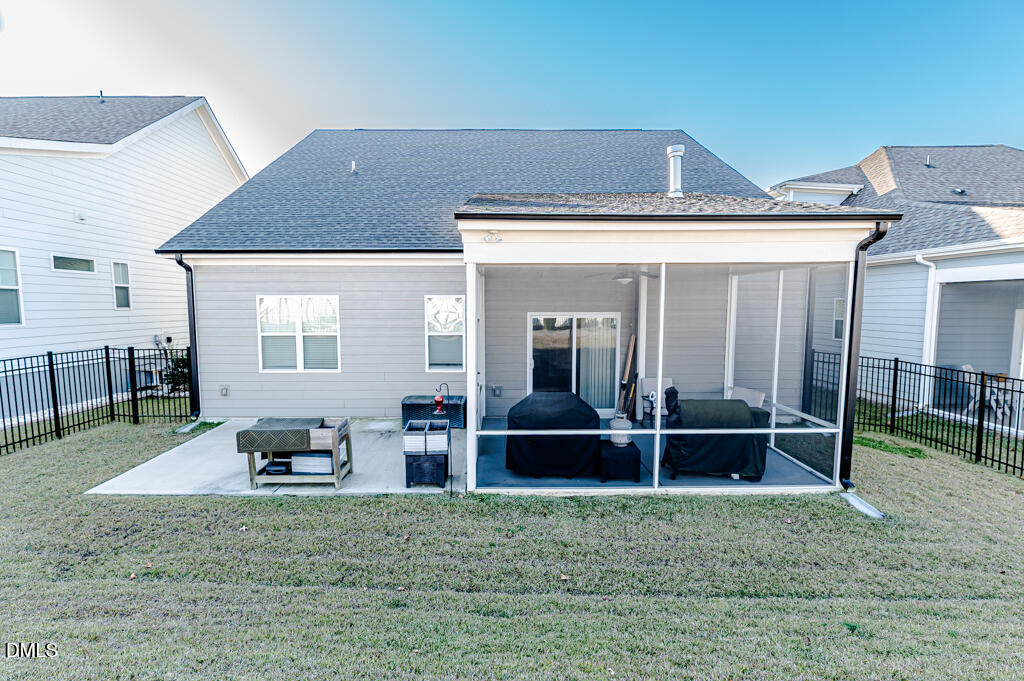 22 Camille Brooks Drive Angier, NC 27501 - Photo 47 of 52 a front view of a house with a yard