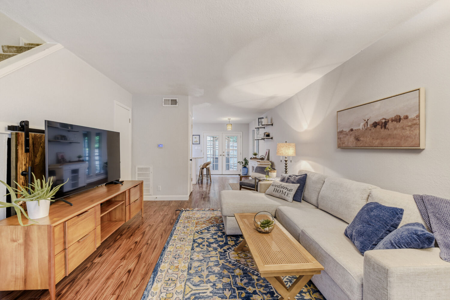 1912 Lightsey Road, Unit 6 Austin, TX 78704 - Photo 3 of 27 a living room with furniture and a flat screen tv