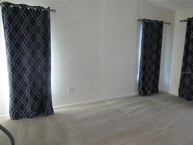 a bathroom with a shower and a toilet