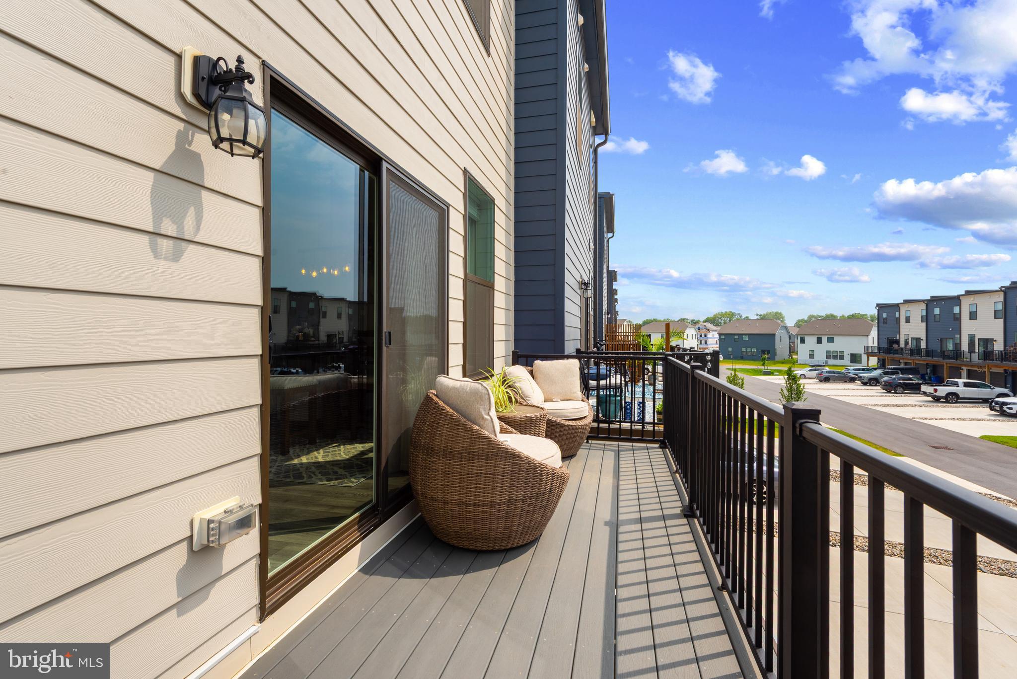 477 Tiller Street Frederick, MD 21701 - Photo 11 of 35 a view of roof deck with seating space and wooden floor