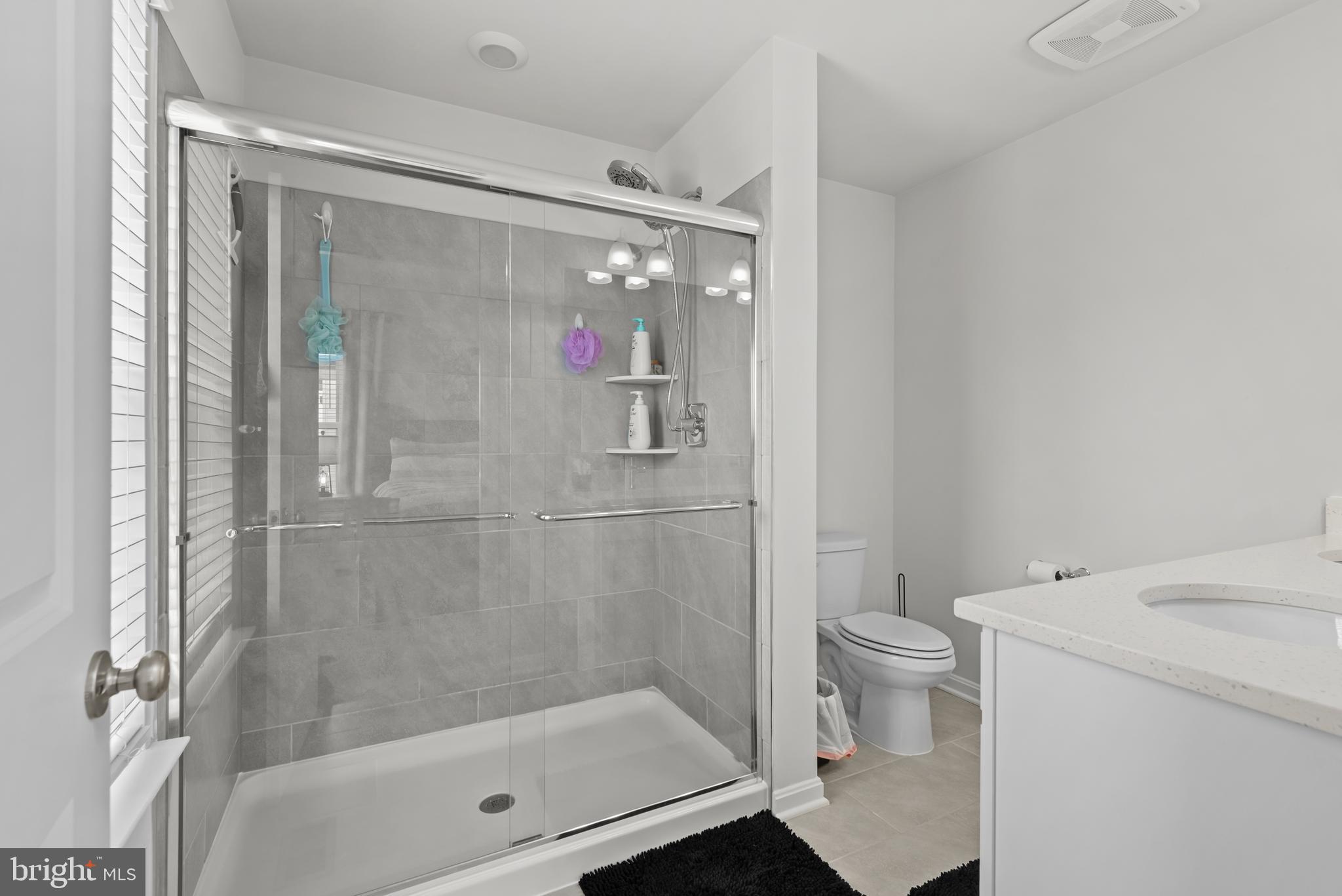 477 Tiller Street Frederick, MD 21701 - Photo 15 of 35 a bathroom with a shower and a toilet