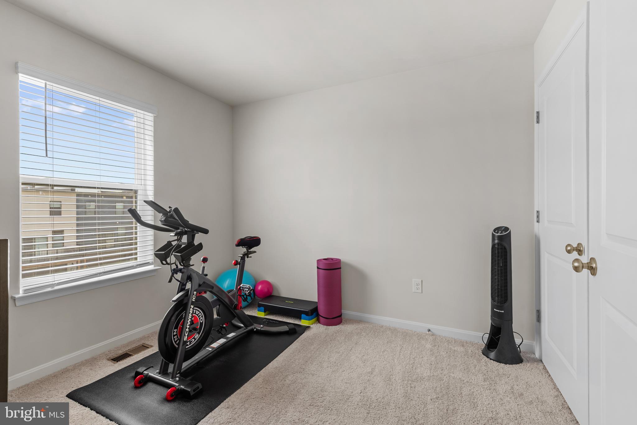 477 Tiller Street Frederick, MD 21701 - Photo 18 of 35 a view of a room with gym equipment