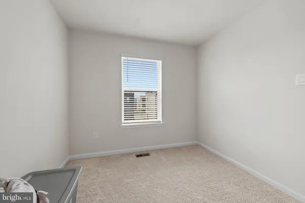 a room with toys and dresser