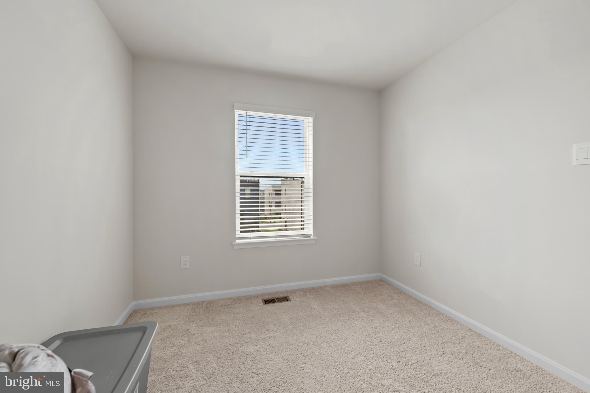 477 Tiller Street Frederick, MD 21701 - Photo 19 of 35 a view of an empty room with a window