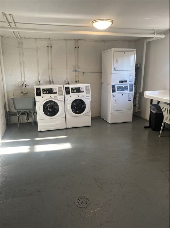 A2 Colonial Drive, Unit 10 Andover, MA 01810 - Photo 15 of 20 a utility room with dryer and washer
