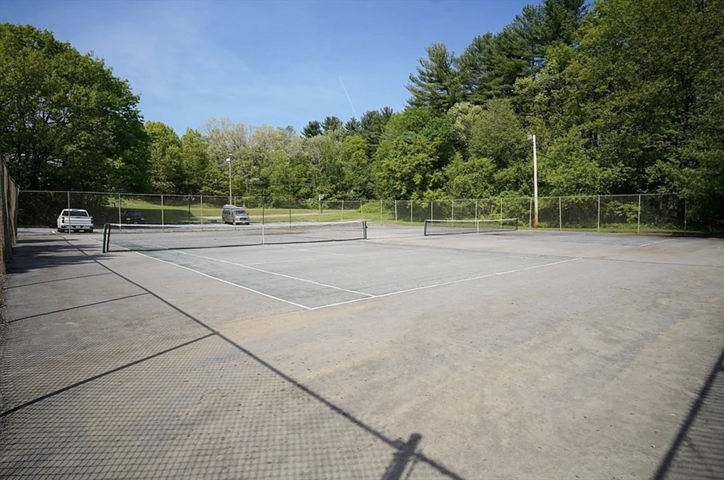 A2 Colonial Drive, Unit 10 Andover, MA 01810 - Photo 16 of 20 a view of a tennis court