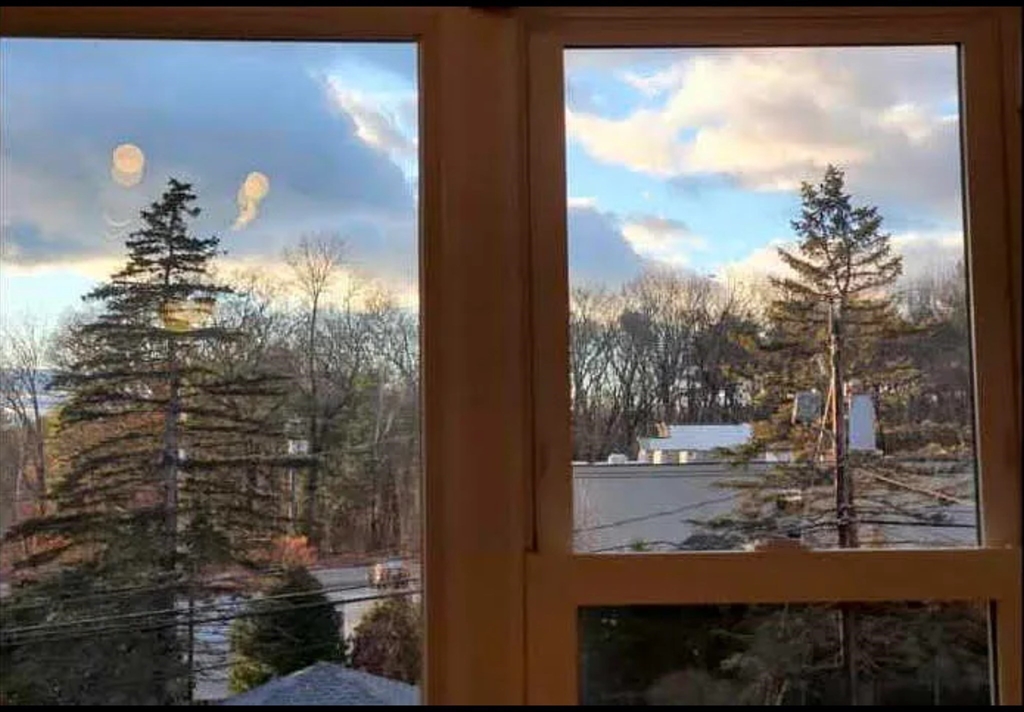 A2 Colonial Drive, Unit 10 Andover, MA 01810 - Photo 20 of 20 a view of a glass door