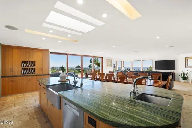 a view of swimming pool with outdoor seating and couches