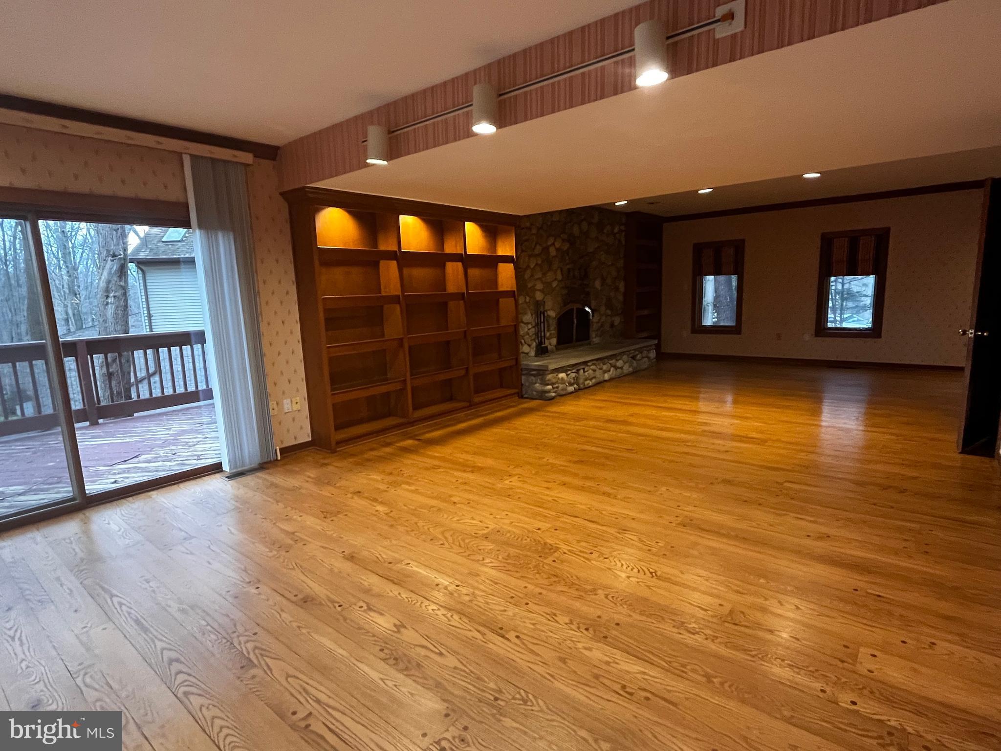 10 Redgate Court Silver Spring, MD 20905 - Photo 13 of 49 Den with upgraded hardwoods, rec. lighting