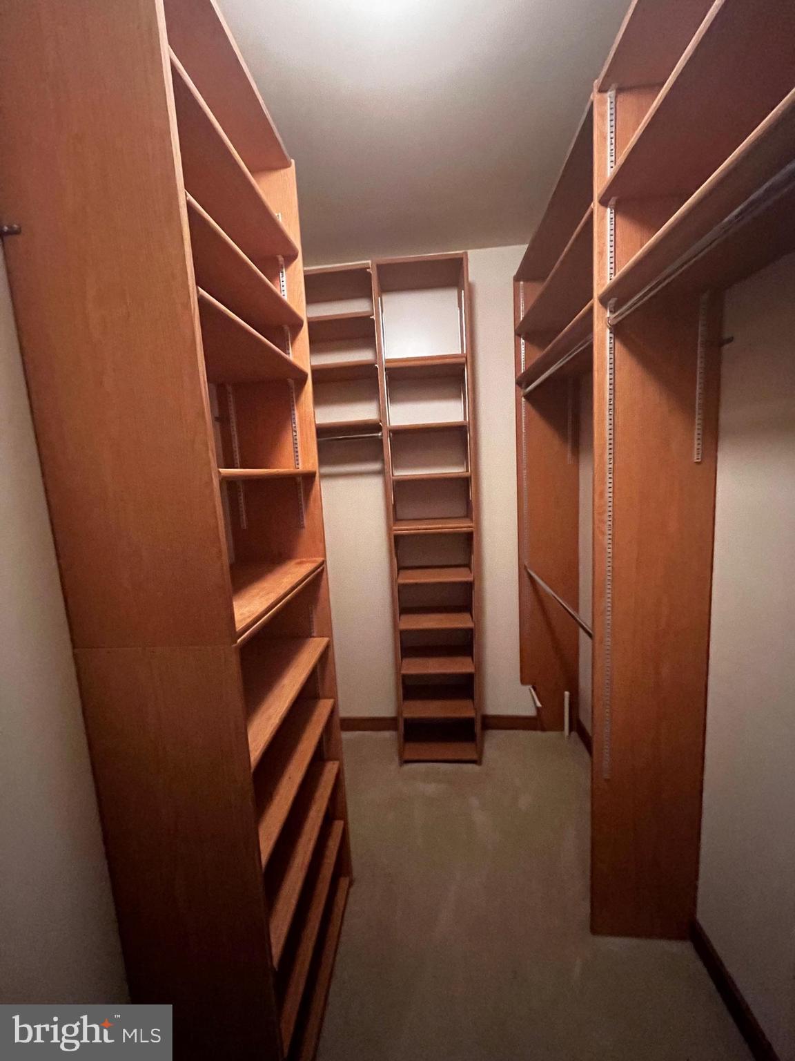 10 Redgate Court Silver Spring, MD 20905 - Photo 22 of 49 Walk-in closet with shelving