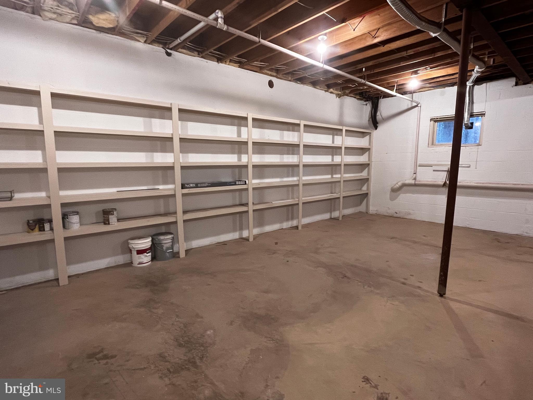 10 Redgate Court Silver Spring, MD 20905 - Photo 44 of 49 Bonus storage room, shelves, high ceiling