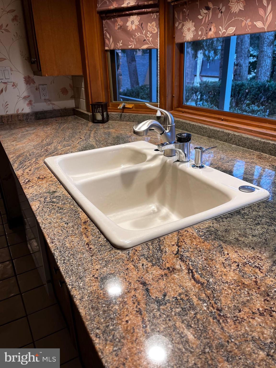 10 Redgate Court Silver Spring, MD 20905 - Photo 6 of 49 Granite counters, ceramic sink