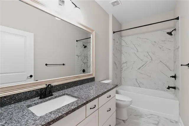 front view of a house and a yard