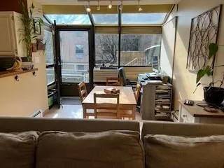 a living room with a couch and a flat screen tv