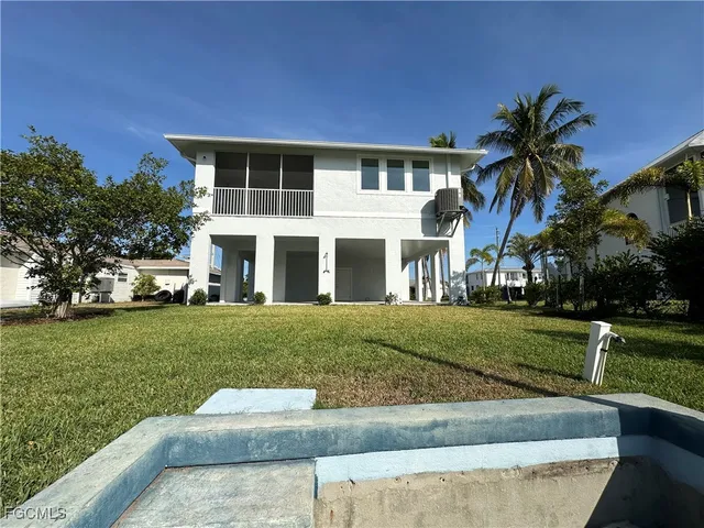 a view of a hallway view with staircase