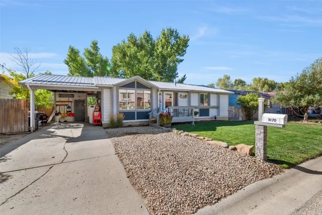front view of a house with a patio