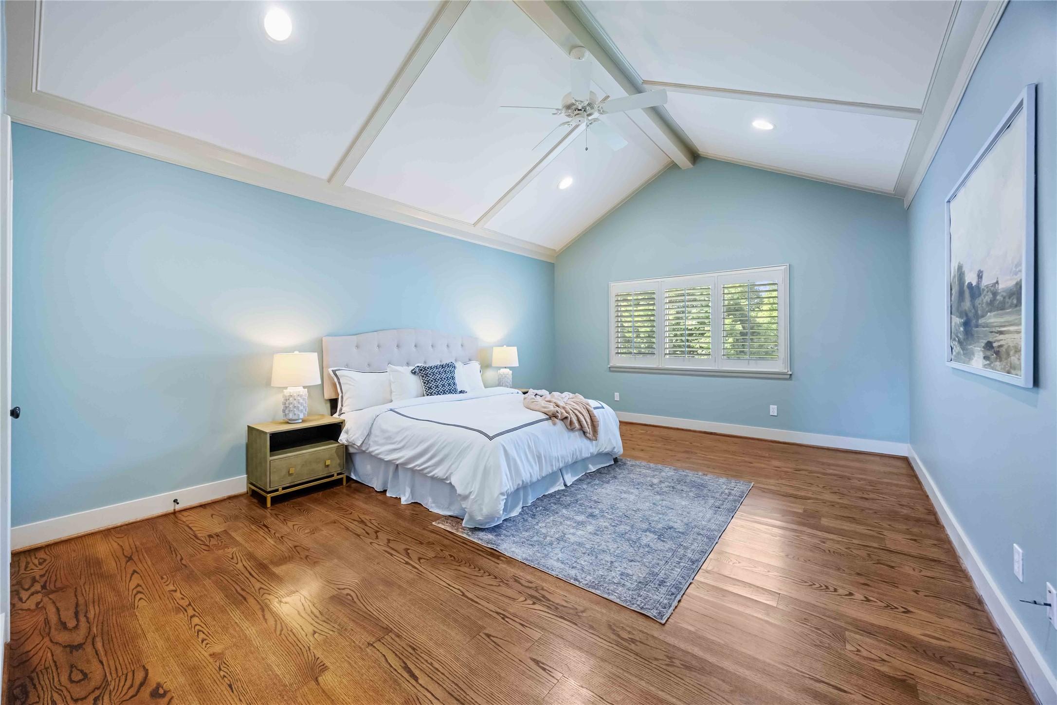3541 Michaux Street Houston, TX 77009 - Photo 20 of 32 Primary Bedroom with beautiful wood floors, vaulted ceiling and plantation shutters.