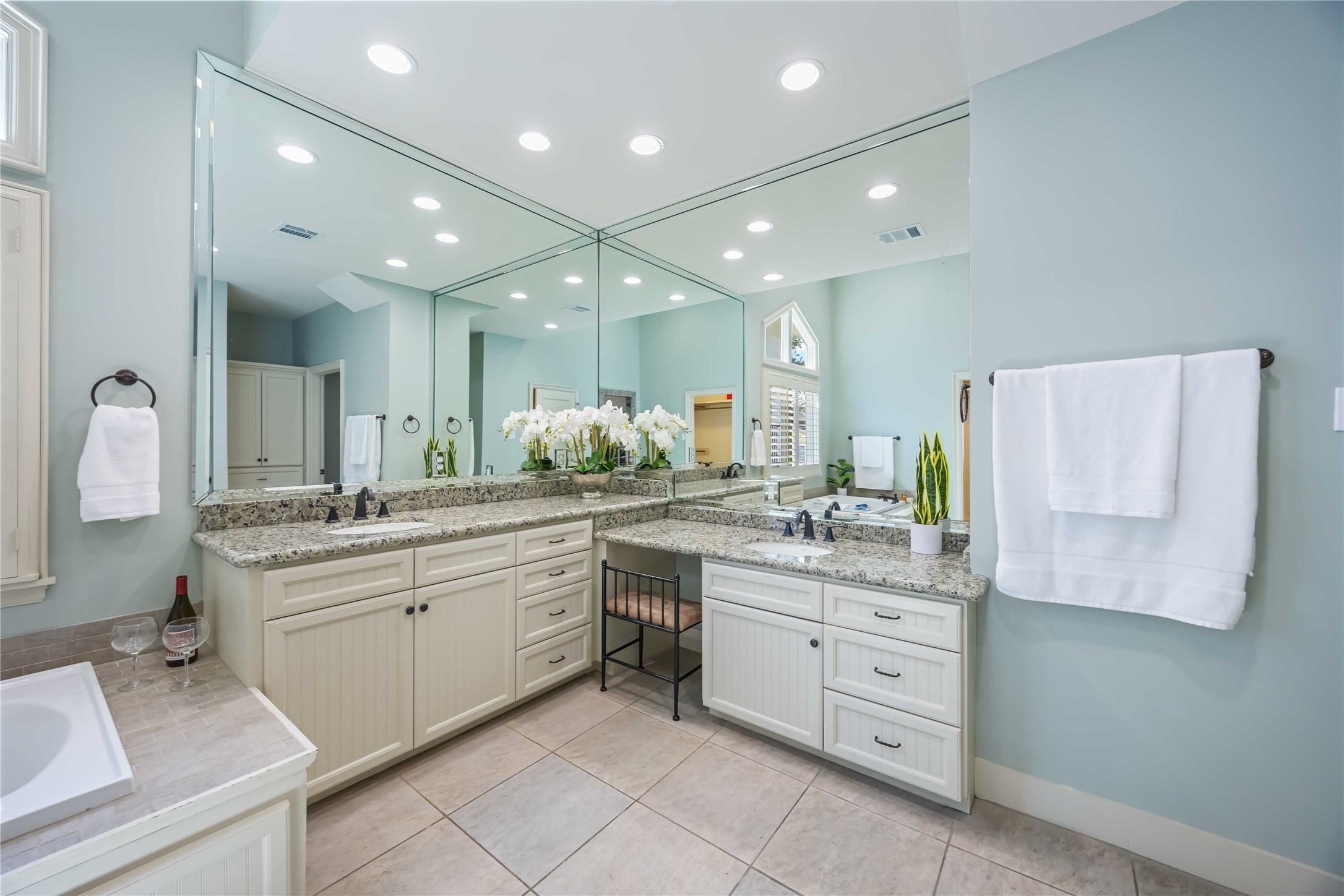 3541 Michaux Street Houston, TX 77009 - Photo 24 of 32 Two sinks and a built in vanity have granite tops and plenty of storage for all your spa treatments