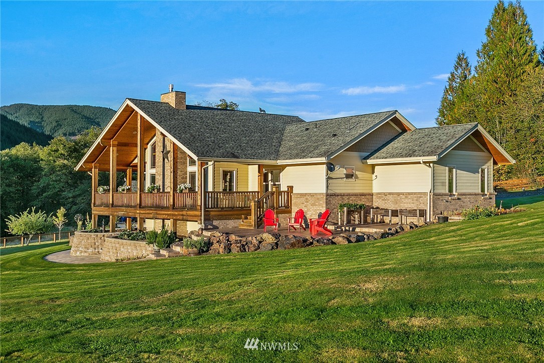 401 Highland Valley Road Morton, WA 98356 - Photo 4 of 39 a view of a house with a big yard