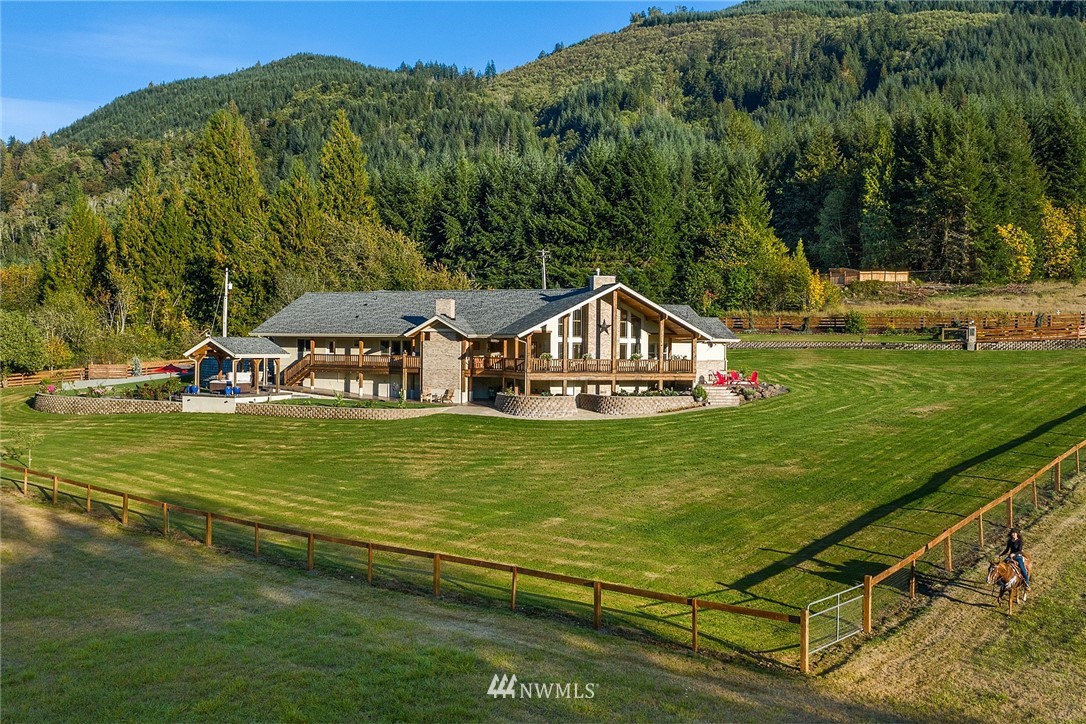 401 Highland Valley Road Morton, WA 98356 - Photo 32 of 39 a view of a house with a big yard