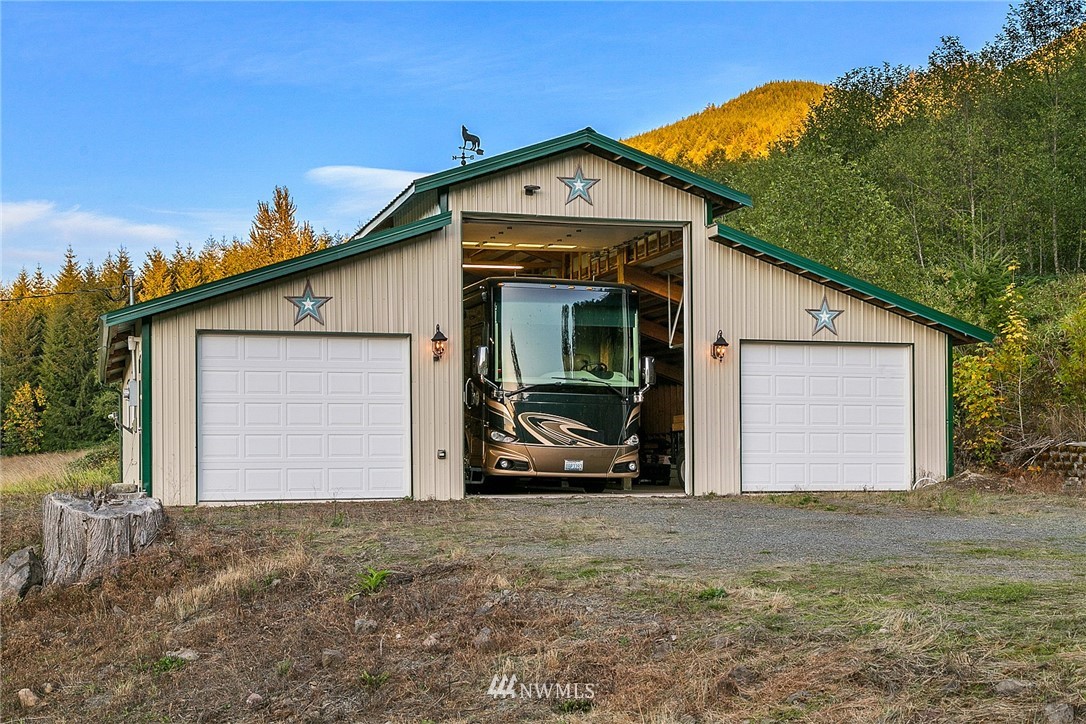 401 Highland Valley Road Morton, WA 98356 - Photo 36 of 39 a view of a house with a yard