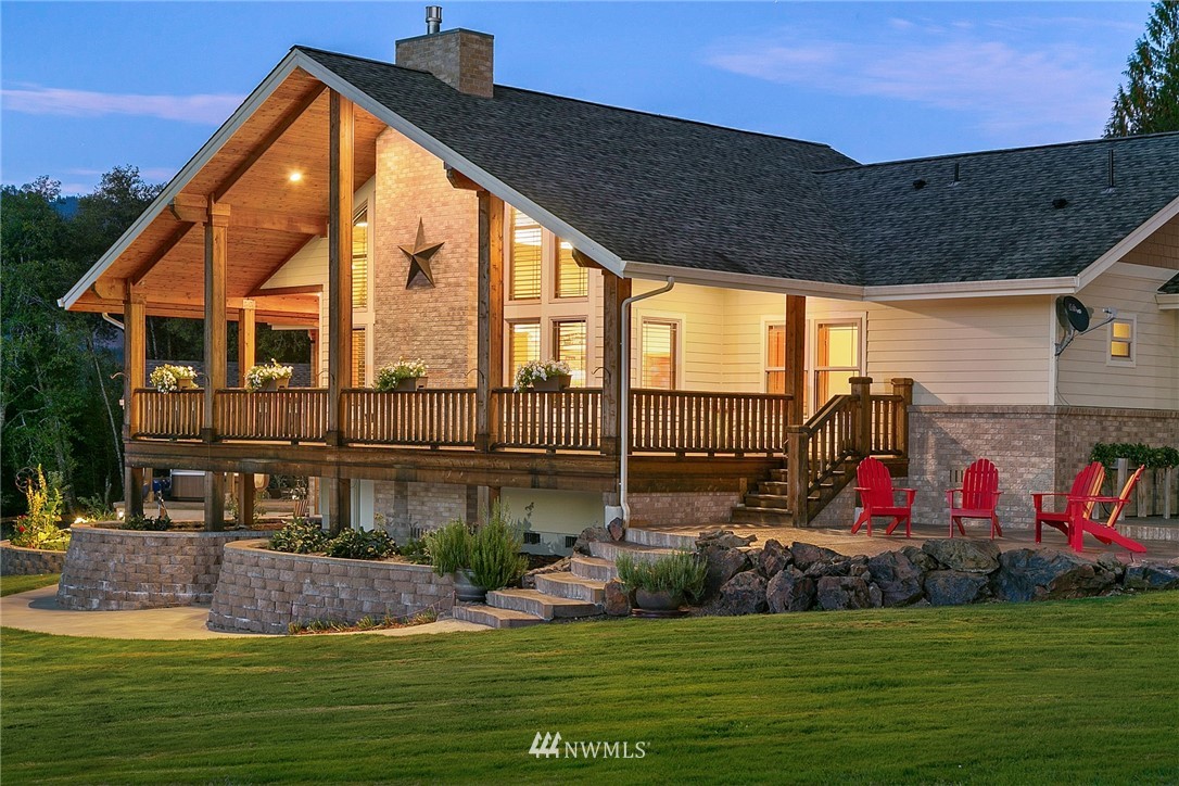 401 Highland Valley Road Morton, WA 98356 - Photo 5 of 39 a view of a house with a swimming pool