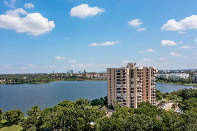 a view of a lake with a city