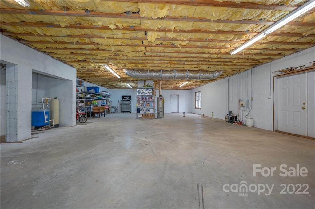 749 Parris Road Rutherfordton, NC 28139 - Photo 31 of 47 a view of empty room with wooden ceiling