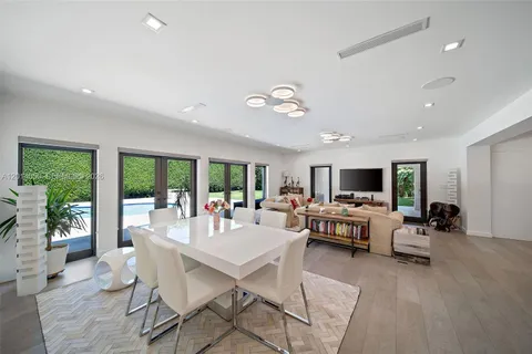 a living room with furniture fireplace and flat screen tv