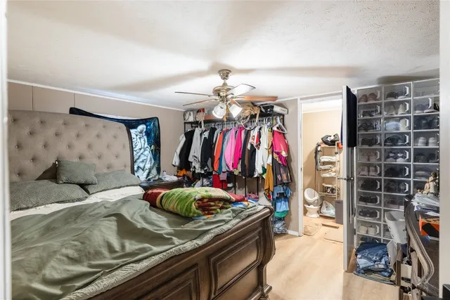 a view of a livingroom with furniture and closet