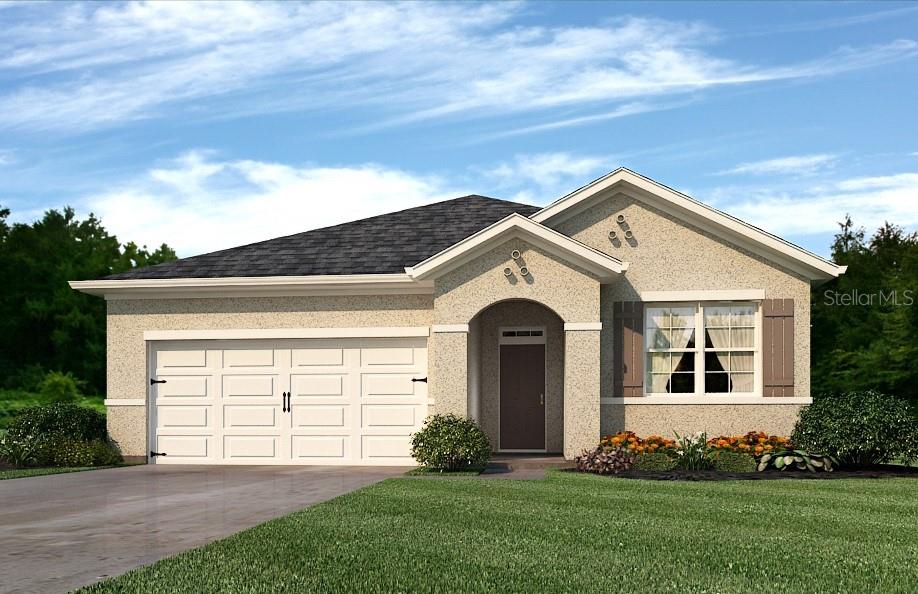 1929 Partin Terrace Road Kissimmee, FL 34744 - Photo 1 of 1 a front view of a house with a garden