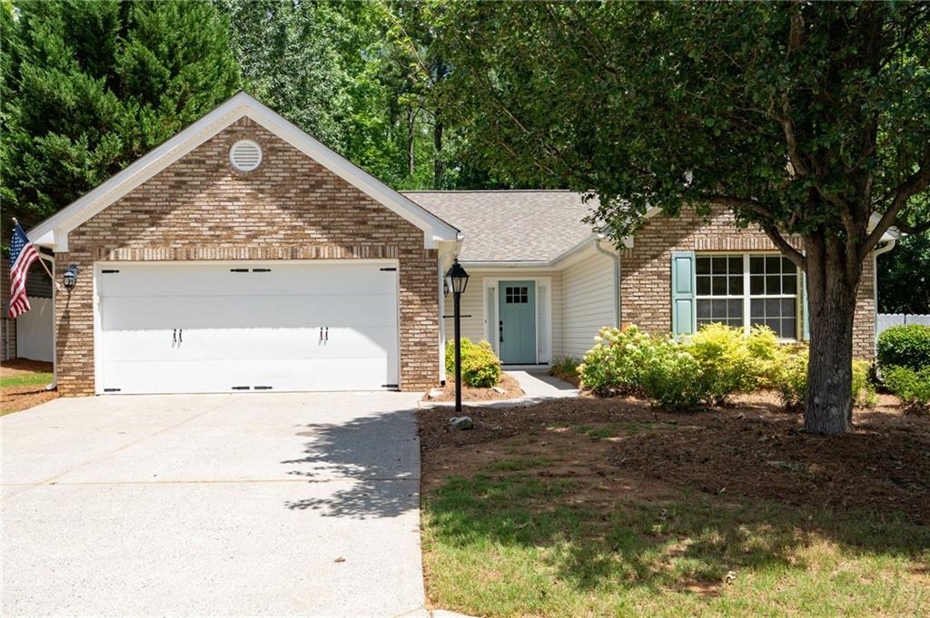 2506 Centennial Commons View Northwest Acworth, GA 30102 - Photo 1 of 1 a view of a house with backyard and garden