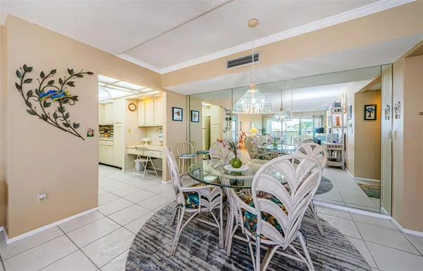 a kitchen with stainless steel appliances granite countertop a sink and a stove
