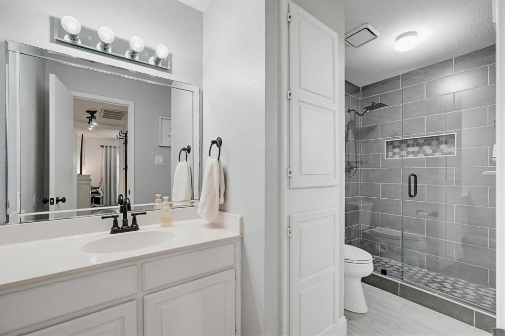 322 West Harwood Road, Unit B Hurst, TX 76054 - Photo 19 of 34 Beautiful bath with upgraded shower